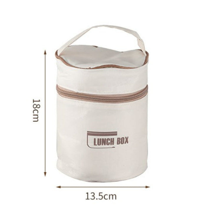 "Isolerad bärbar lunchlåda i blått, brun och beige. Vakuumisolerad för värme och läckagesäker design för mat på språng."