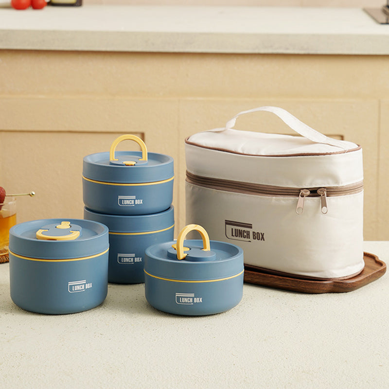 "Isolerad bärbar lunchlåda i blått, brun och beige. Vakuumisolerad för värme och läckagesäker design för mat på språng."