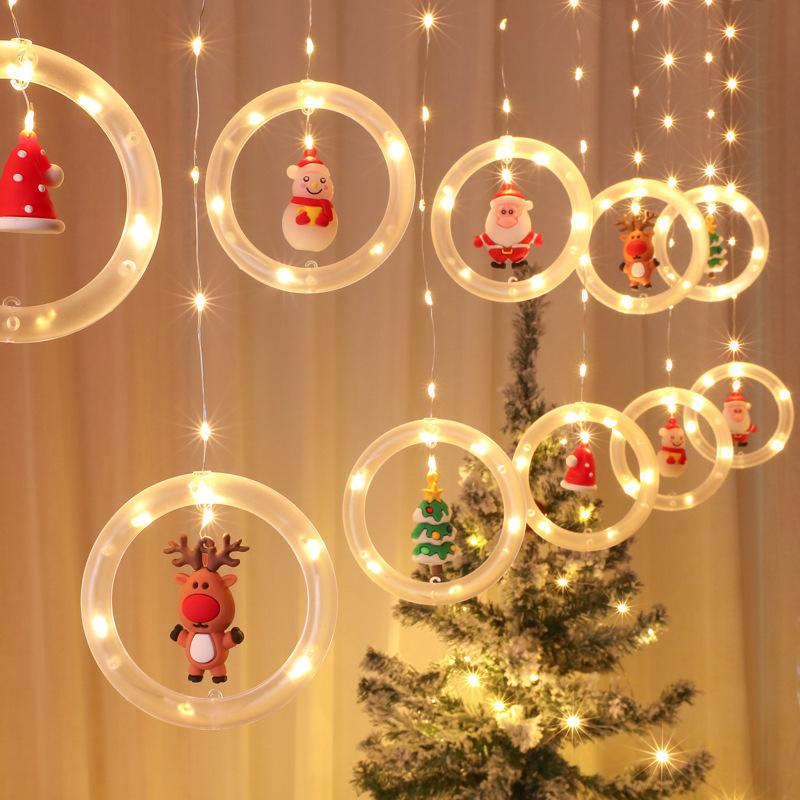 "Jul LED gardinsträngljus med varmvitt ljus, perfekt dekoration för väggar, fönster och julgranar under festsäsongen."