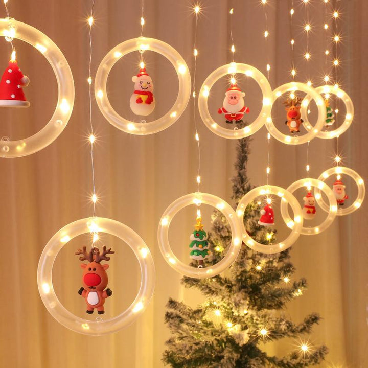 "Jul LED gardinsträngljus med varmvitt ljus, perfekt dekoration för väggar, fönster och julgranar under festsäsongen."