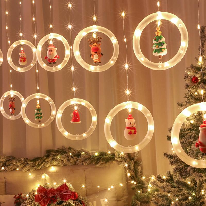 "Jul LED gardinsträngljus med varmvitt ljus, perfekt dekoration för väggar, fönster och julgranar under festsäsongen."