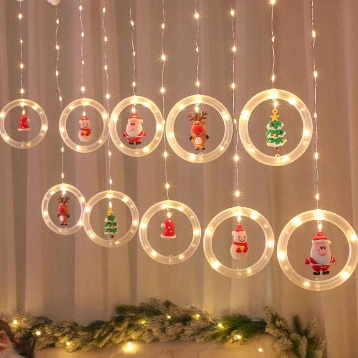 "Jul LED gardinsträngljus med varmvitt ljus, perfekt dekoration för väggar, fönster och julgranar under festsäsongen."