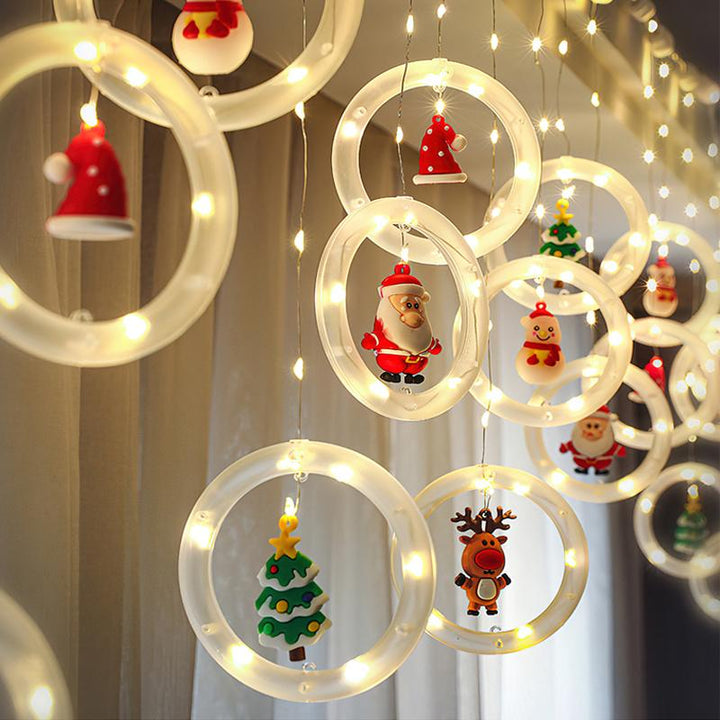 "Jul LED gardinsträngljus med varmvitt ljus, perfekt dekoration för väggar, fönster och julgranar under festsäsongen."