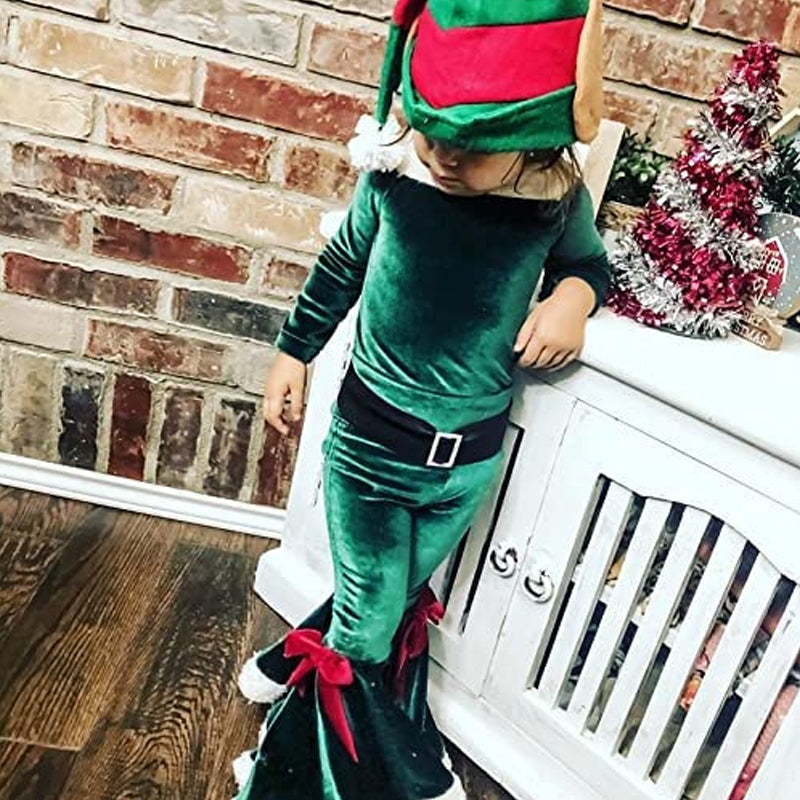 "Juligt barnset i röd/grön sammet och sherpa, tvådelat med festliga klockor för jul, ger stil och komfort."