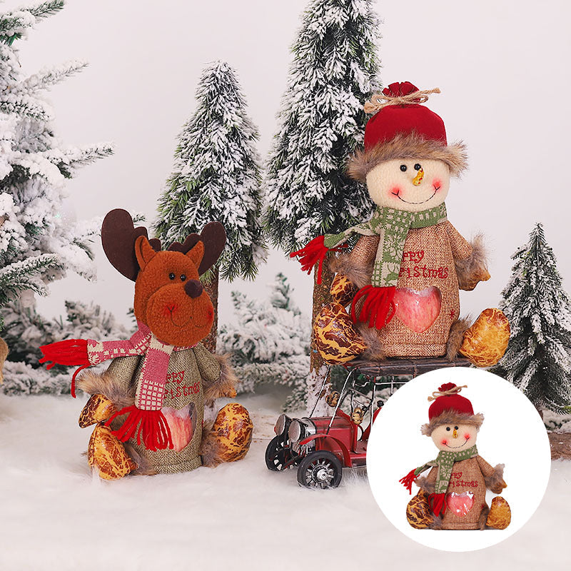 "Julklappspåsar med dragkedja, snögubbar och tomtenissar, i robust tyg, för dekorativ och säker julklappsinslagning."