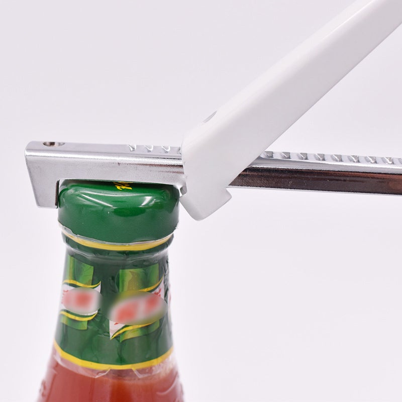 Justerbar burköppnare i rostfritt stål, elegant design, passar flera lockstorlekar, perfekt för kök och camping.
