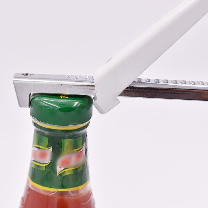 Justerbar burköppnare i rostfritt stål, elegant design, passar flera lockstorlekar, perfekt för kök och camping.