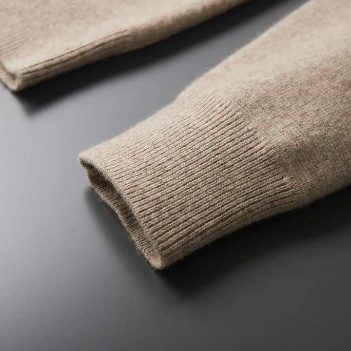 "Kashmirväst för män, elegant och mångsidig, med dragkedja och minimalistisk design, i beige kashmir"