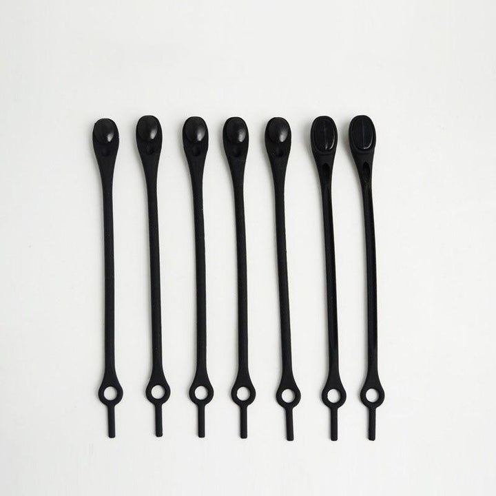 "Knytfria silikon skosnören i färgglada nyanser, elastiska och vattentäta, för unisex skor med öljetter."