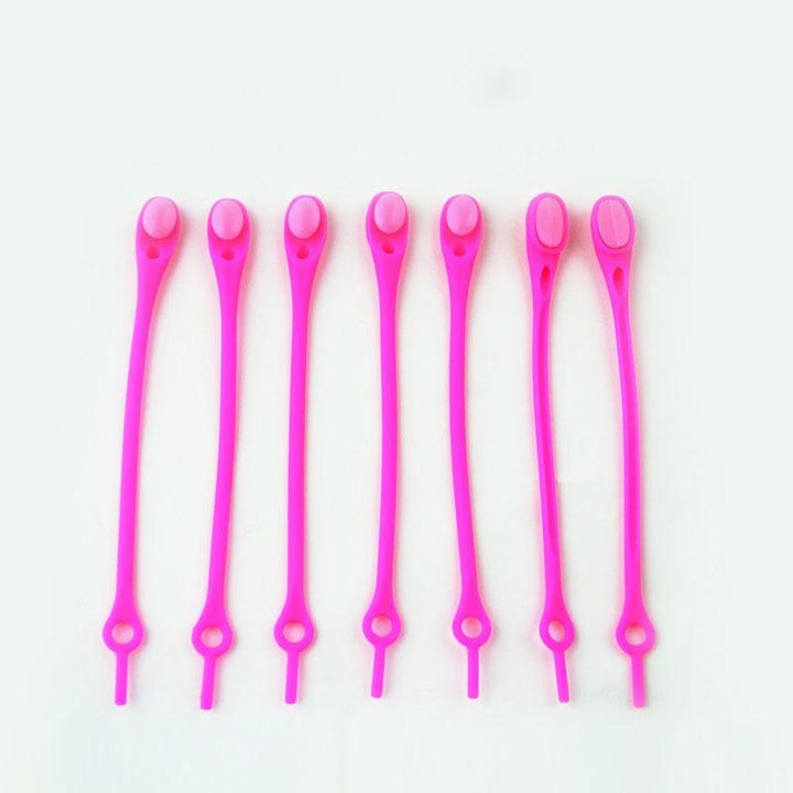 "Knytfria silikon skosnören i färgglada nyanser, elastiska och vattentäta, för unisex skor med öljetter."