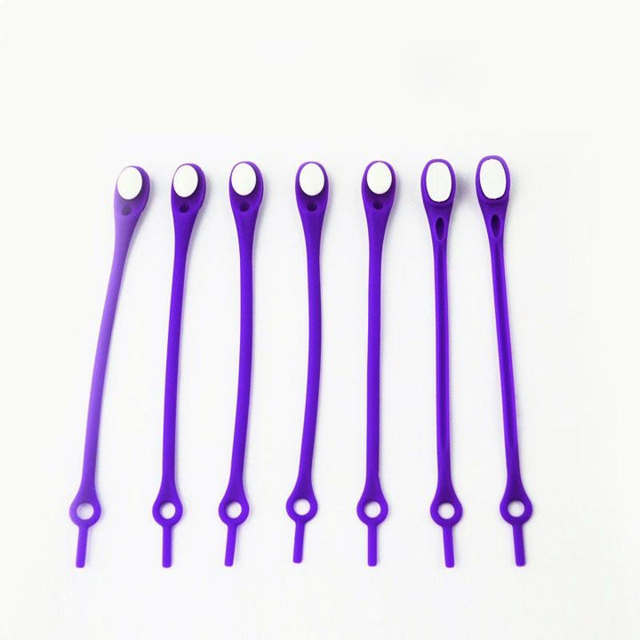 "Knytfria silikon skosnören i färgglada nyanser, elastiska och vattentäta, för unisex skor med öljetter."