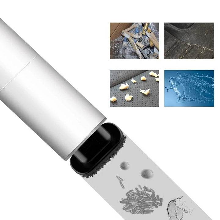 "Kompakt bärbar handdammsugare med kraftig sugning, perfekt för bilinteriörstädning. Svart design med mångsidiga munstycken."