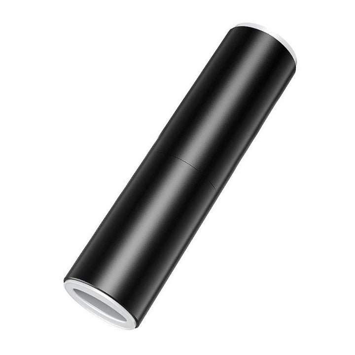 "Kompakt bärbar handdammsugare med kraftig sugning, perfekt för bilinteriörstädning. Svart design med mångsidiga munstycken."