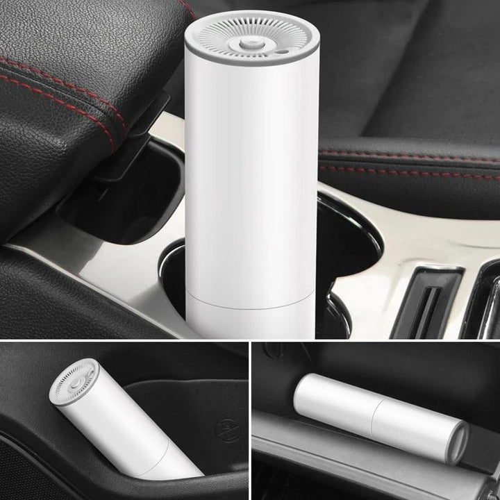 "Kompakt bärbar handdammsugare med kraftig sugning, perfekt för bilinteriörstädning. Svart design med mångsidiga munstycken."