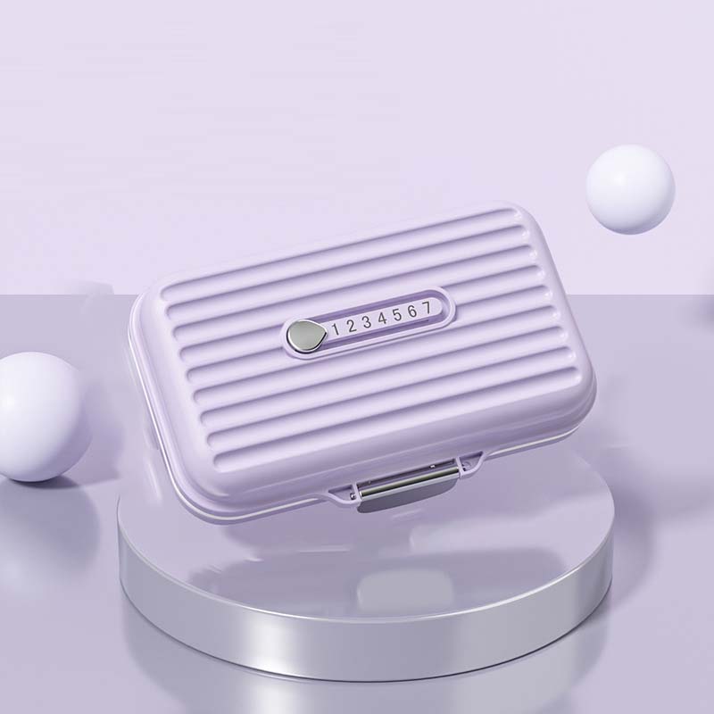 "Kompakt pillerburk med sju fack, rosa nyans, idealisk för moderna kvinnor, skyddar medicin mot fukt och damm."