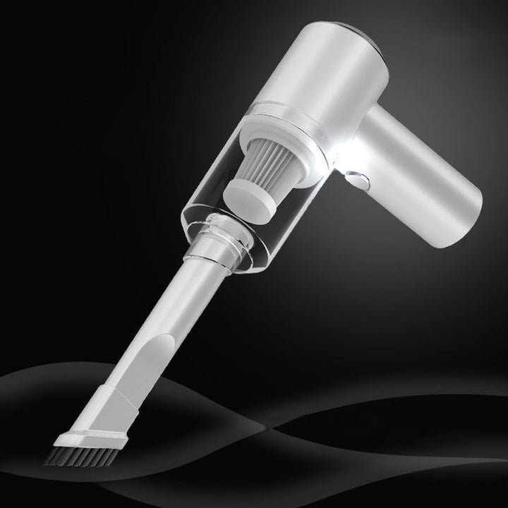 "Kompakt trådlös handhållen bildammsugare i svart för hem och bil, med kraftfull sugkapacitet och enkel hantering."