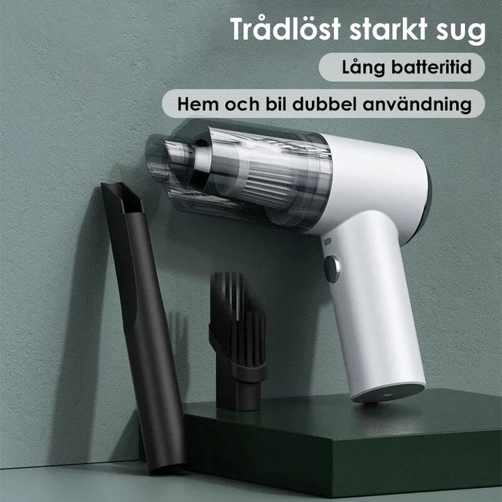 "Kompakt trådlös handhållen bildammsugare i svart för hem och bil, med kraftfull sugkapacitet och enkel hantering."