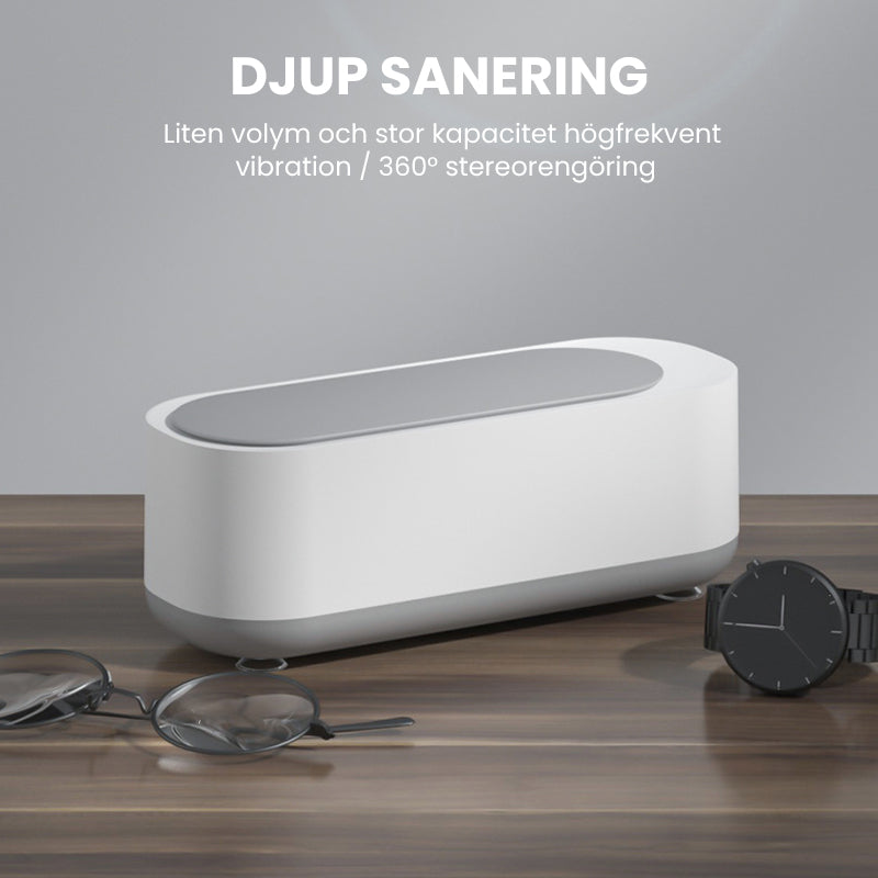 "Kompakt vit och grå ultraljudsrengöringsmaskin, idealisk för smycken och glasögon, bärbar och effektiv rengöring."