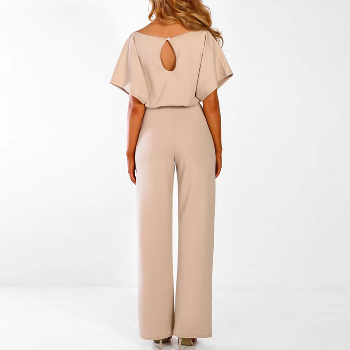 Kortärmad dams jumpsuit med vida ben och justerbart midjeband i olika färger, perfekt för alla tillfällen.
