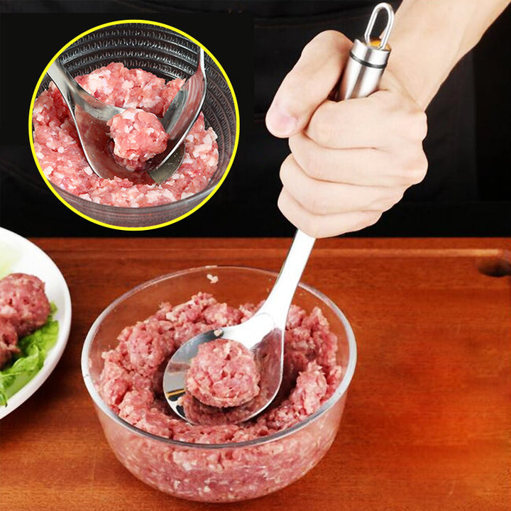 "Köttbullssked av rostfritt stål, silverfärgad, med ergonomiskt handtag och håldesign, perfekt för köttbullsformning."