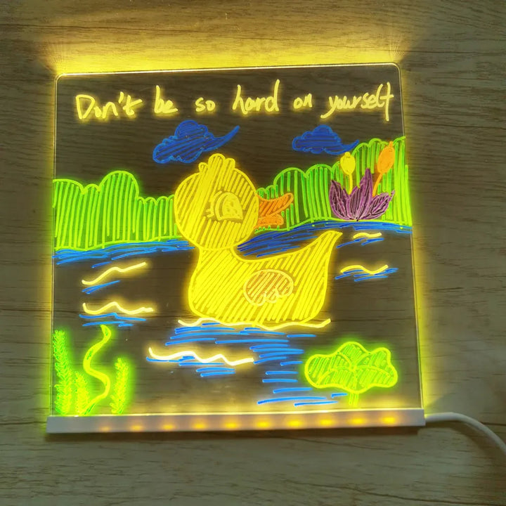 "Kreativ LED-rittavla med USB-laddning och justerbart ljus, akryl- och ABS-material, perfekt för barns lek och lärande."