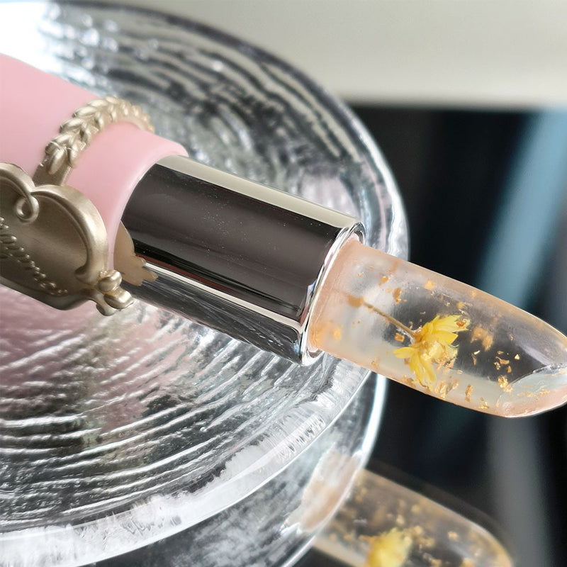 "Kristallgeléblomma färgskiftande läppstift, unikt och elegant med blomma inuti, vårdande naturliga ingredienser."