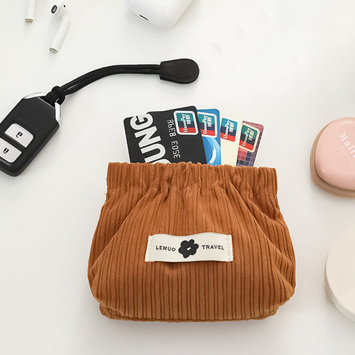 "Kvinnors corduroy hårsnodd organisatör, mjuk material, multifunktionell design, stilren blå nyans, kompakt storlek."