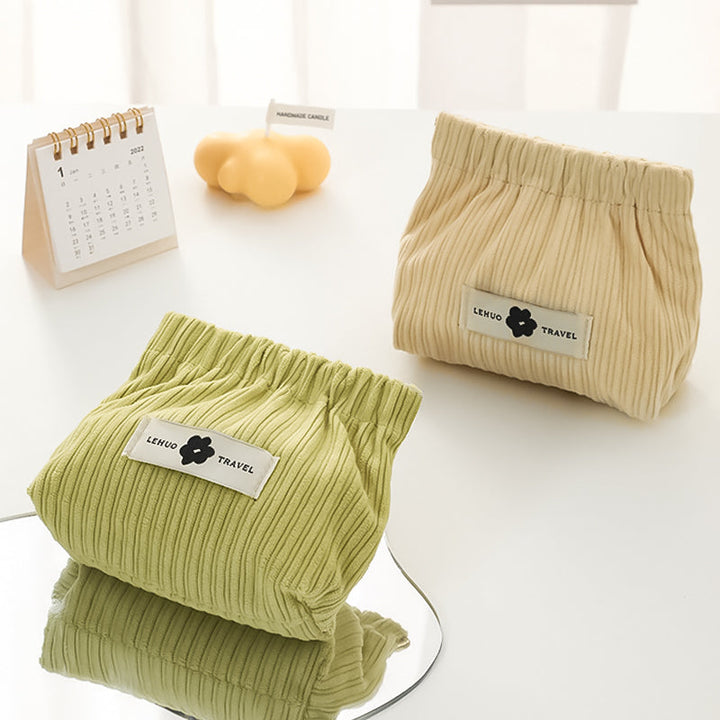"Kvinnors corduroy hårsnodd organisatör, mjuk material, multifunktionell design, stilren blå nyans, kompakt storlek."