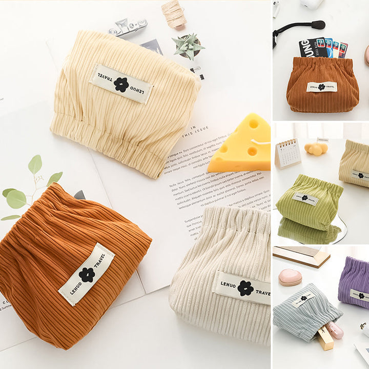 "Kvinnors corduroy hårsnodd organisatör, mjuk material, multifunktionell design, stilren blå nyans, kompakt storlek."