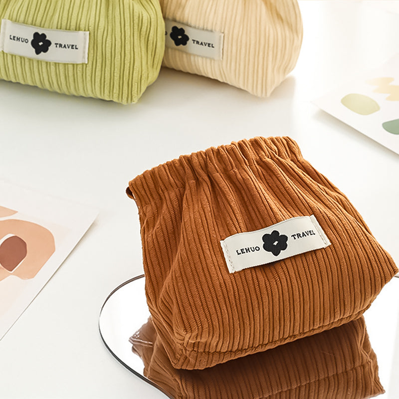 "Kvinnors corduroy hårsnodd organisatör, mjuk material, multifunktionell design, stilren blå nyans, kompakt storlek."