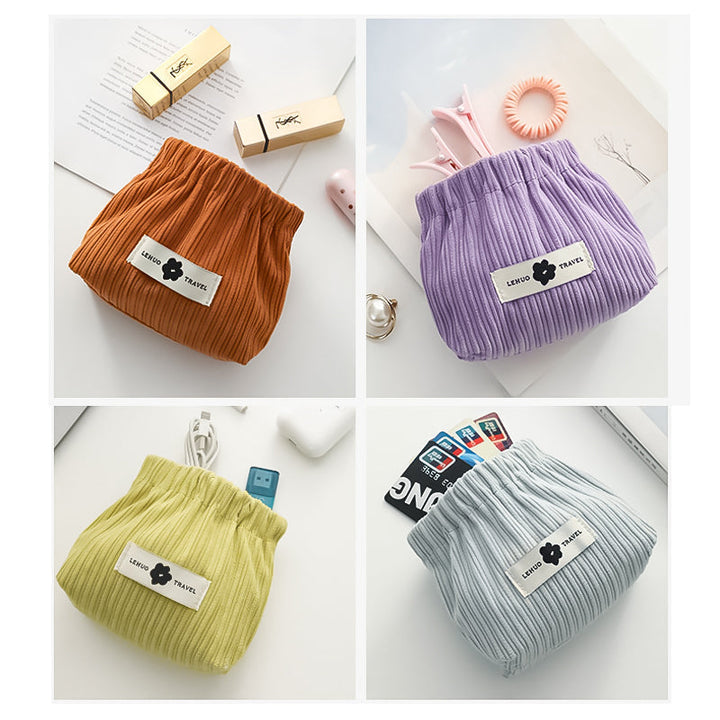 "Kvinnors corduroy hårsnodd organisatör, mjuk material, multifunktionell design, stilren blå nyans, kompakt storlek."