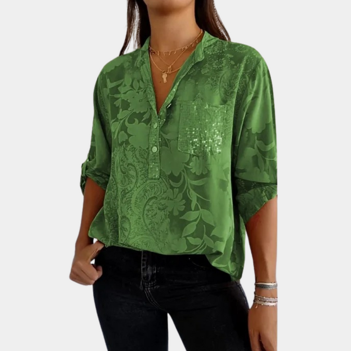 "Långärmad justerbar damblus i lila, elegant design med lätt material, perfekt för både kontorsbruk och vardag."