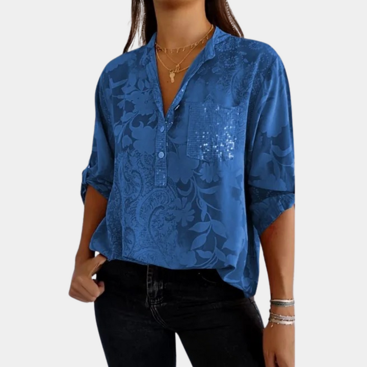 "Långärmad justerbar damblus i lila, elegant design med lätt material, perfekt för både kontorsbruk och vardag."