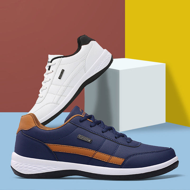 "Lätta herrsneakers i svart, brun och grå, med rund tå och snörningsfri design för komfort och stil."