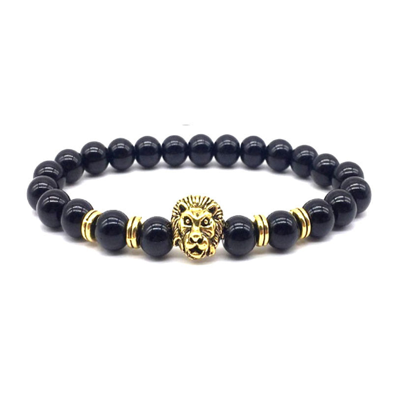 "Lejonarmband för män med onyx och stål, mattsvarta pärlor och lejonhuvud, symbol för styrka och kärlek"