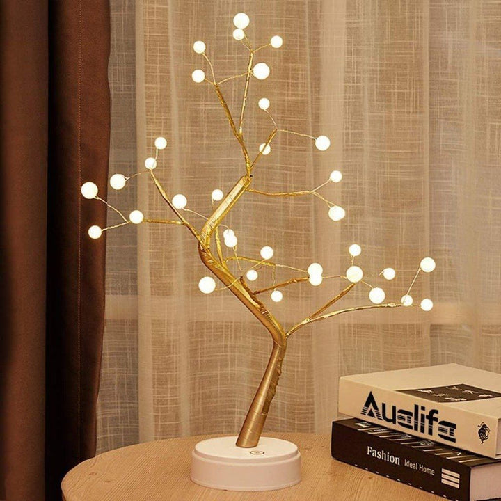 "Ljusande Andeträ bonsaiträd med LED, elegant koppartråd, sprider magisk glöd, perfekt för heminredning."