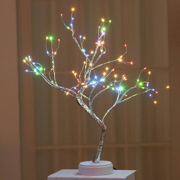 "Ljusande Andeträ bonsaiträd med LED, elegant koppartråd, sprider magisk glöd, perfekt för heminredning."