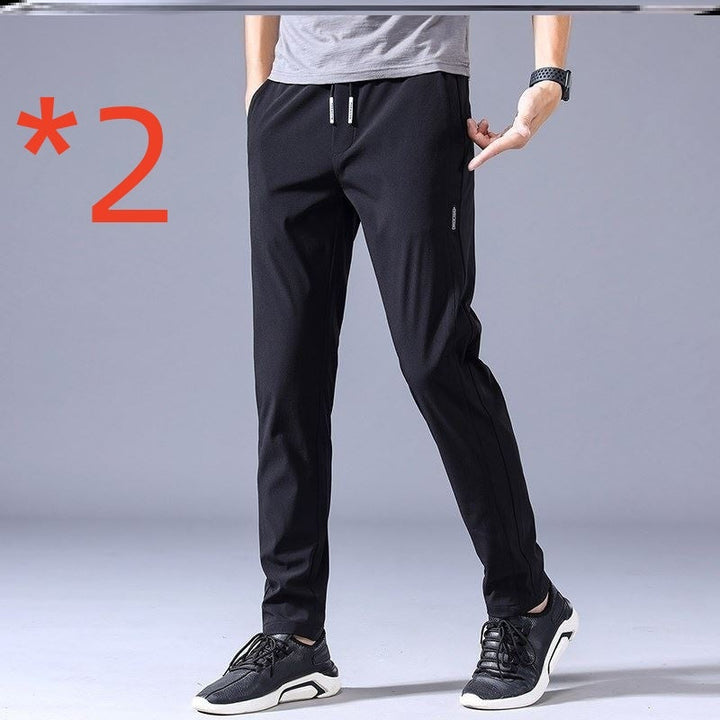"Lösa rak sweatpants för män i koreansk stil, avslappnad passform, flerfärgade alternativ, idealiska för stil och komfort."