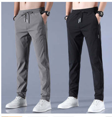"Lösa rak sweatpants för män i koreansk stil, avslappnad passform, flerfärgade alternativ, idealiska för stil och komfort."