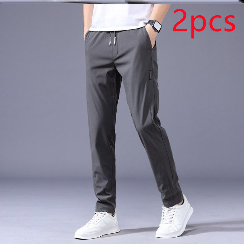 "Lösa rak sweatpants för män i koreansk stil, avslappnad passform, flerfärgade alternativ, idealiska för stil och komfort."
