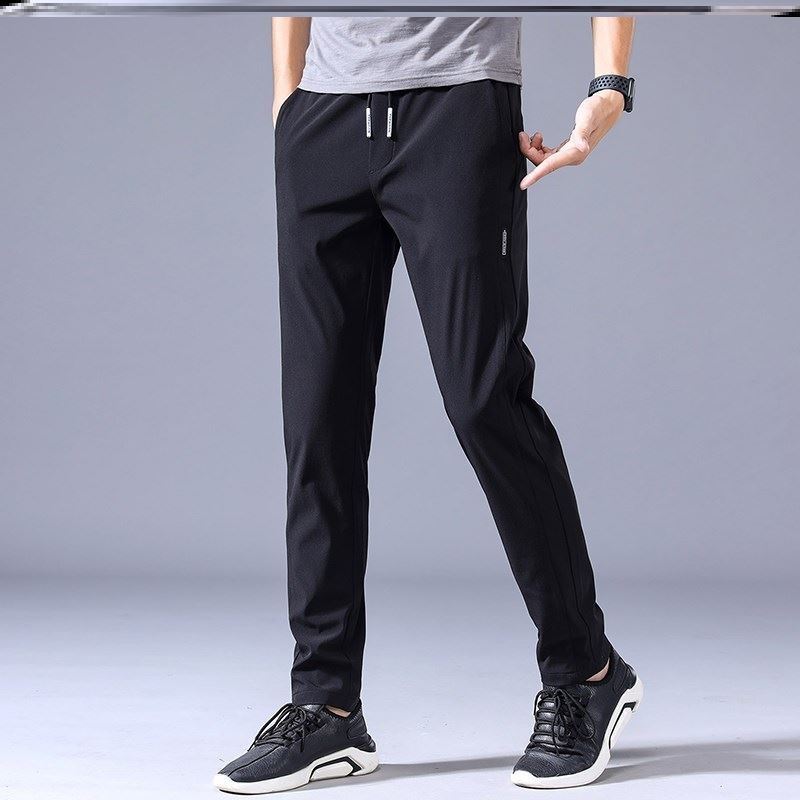 "Lösa rak sweatpants för män i koreansk stil, avslappnad passform, flerfärgade alternativ, idealiska för stil och komfort."