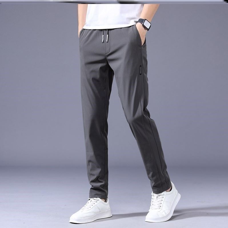 "Lösa rak sweatpants för män i koreansk stil, avslappnad passform, flerfärgade alternativ, idealiska för stil och komfort."