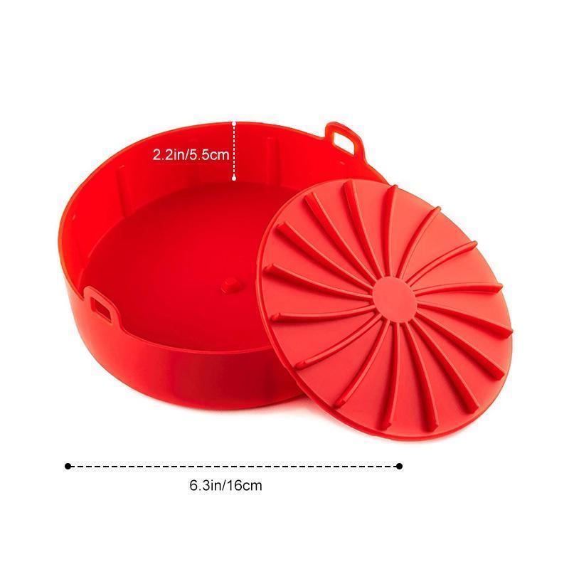 "Luftfritös-bricka i röd/grå silikon, non-stick yta, liten/stor, för jämn tillagning och renare fritös."
