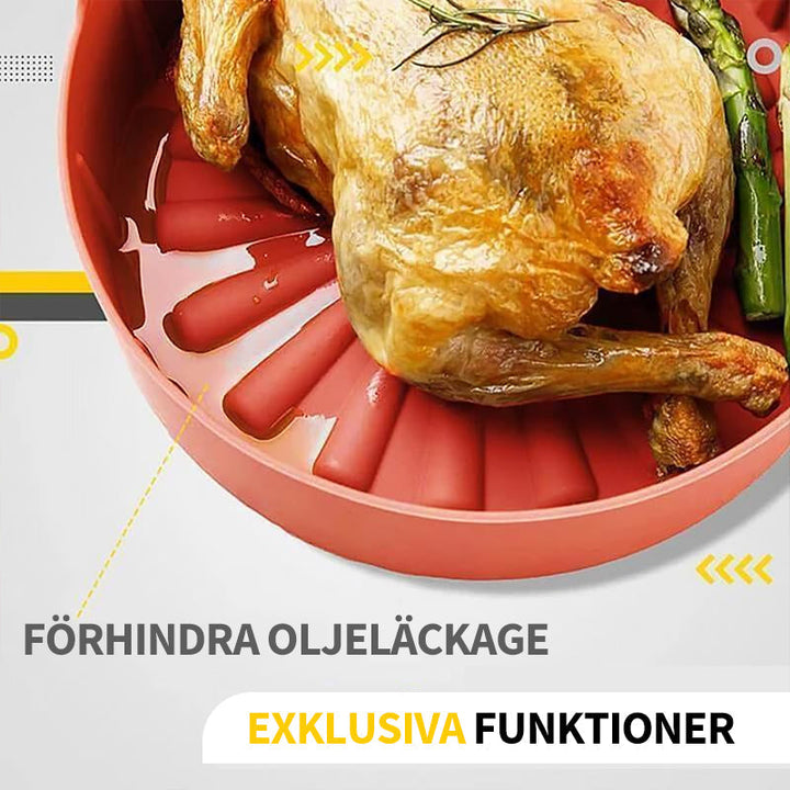 "Luftfritös-bricka i röd/grå silikon, non-stick yta, liten/stor, för jämn tillagning och renare fritös."