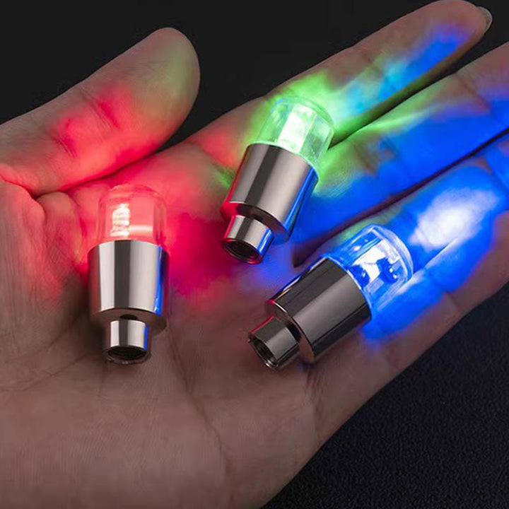 "Lysande LED-belysning för däckventiler i blå, röd, grön och flerfärgad; förbättrar stil och säkerhet."