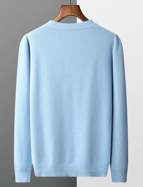 "Lyxig kaschmirkofta i elegant design, beige färg med klassisk knappknäppning, perfekt för stil och komfort."