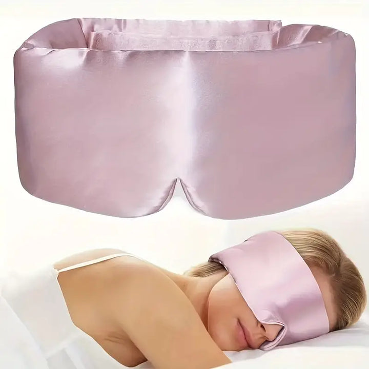 "Lyxig mjuk blackout sovmask i svart med justerbar design för total ljusblockering och optimal sömnkomfort"