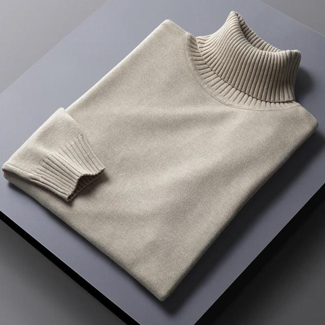 "Lyxig polotröja i mjukt premiummaterial, tidlös design, flera färger såsom grå, svart och vit för mångsidig stil."