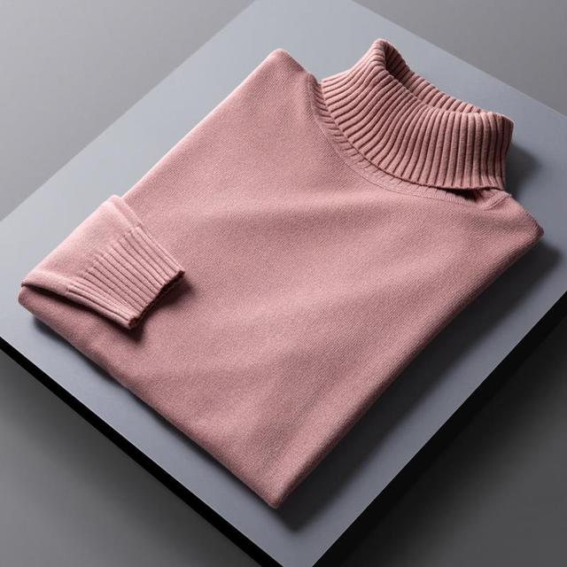 "Lyxig polotröja i mjukt premiummaterial, tidlös design, flera färger såsom grå, svart och vit för mångsidig stil."