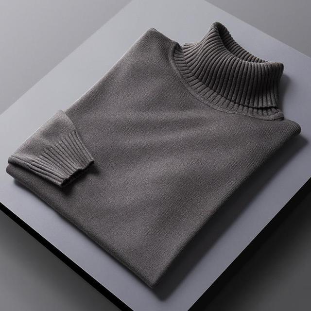 "Lyxig polotröja i mjukt premiummaterial, tidlös design, flera färger såsom grå, svart och vit för mångsidig stil."